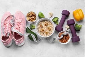 Image of healthy lifestyle choices - weights, vegetables, running shoes, etc.